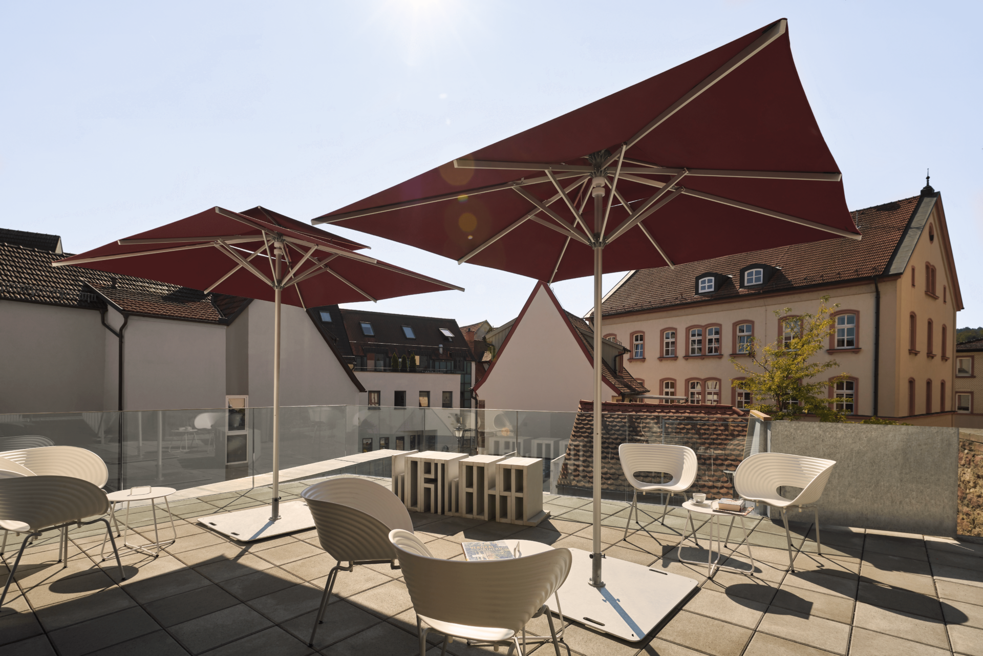 Market parasols made to measure – parasols with centre masts